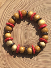 Load image into Gallery viewer, Handmade beaded bracelet on elastic. Made out pink, brown and beige recycled beads.