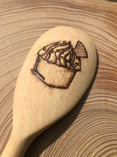 Load image into Gallery viewer, Decorative beech wooden spoon with pyrography detail of a yummy iced cupcake with wafer.
