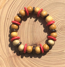 Load image into Gallery viewer, Handmade beaded bracelet on elastic. Made out pink, brown and beige recycled beads.