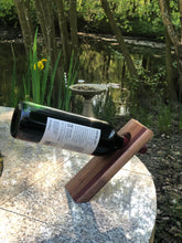 Load image into Gallery viewer, Balancing bottle holder, gravity illusion floating wine bottle stand. Novelty gift for Father’s Day