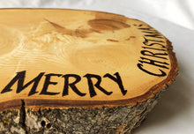 Load image into Gallery viewer, Christmas cake stand solid Ash, with Merry Christmas pyrographed detail.