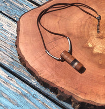 Load image into Gallery viewer, Pendant necklace handmade out of reclaimed hard wood and resin. On adjustable suede cord.