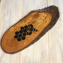 Load image into Gallery viewer, Bee and honey comb pyrography wood slice. Wood burning art on live edge ideal gift for nature lovers.