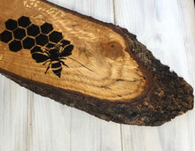 Load image into Gallery viewer, Bee and honey comb pyrography wood slice. Wood burning art on live edge ideal gift for nature lovers.