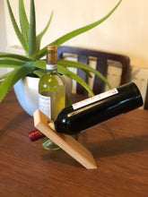Load image into Gallery viewer, Balancing bottle holder, gravity illusion floating wine bottle stand. Novelty gift for Father’s Day