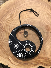Load image into Gallery viewer, Hand painted Yin yang suncatcher. Made from plywood, decorated with black and white acrylic paint with crystal on faux suede cord.
