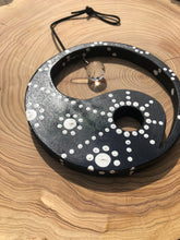 Load image into Gallery viewer, Hand painted Yin yang suncatcher. Made from plywood, decorated with black and white acrylic paint with crystal on faux suede cord.
