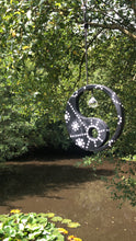Load image into Gallery viewer, Hand painted Yin yang suncatcher. Made from plywood, decorated with black and white acrylic paint with crystal on faux suede cord.
