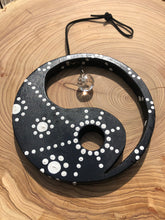 Load image into Gallery viewer, Hand painted Yin yang suncatcher. Made from plywood, decorated with black and white acrylic paint with crystal on faux suede cord.
