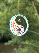 Load image into Gallery viewer, Hand painted Yin yang suncatcher. Made from plywood, decorated with acrylic paint with crystal on faux suede cord.
