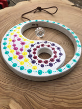 Load image into Gallery viewer, Hand painted Yin yang suncatcher. Made from plywood, decorated with acrylic paint with crystal on faux suede cord.
