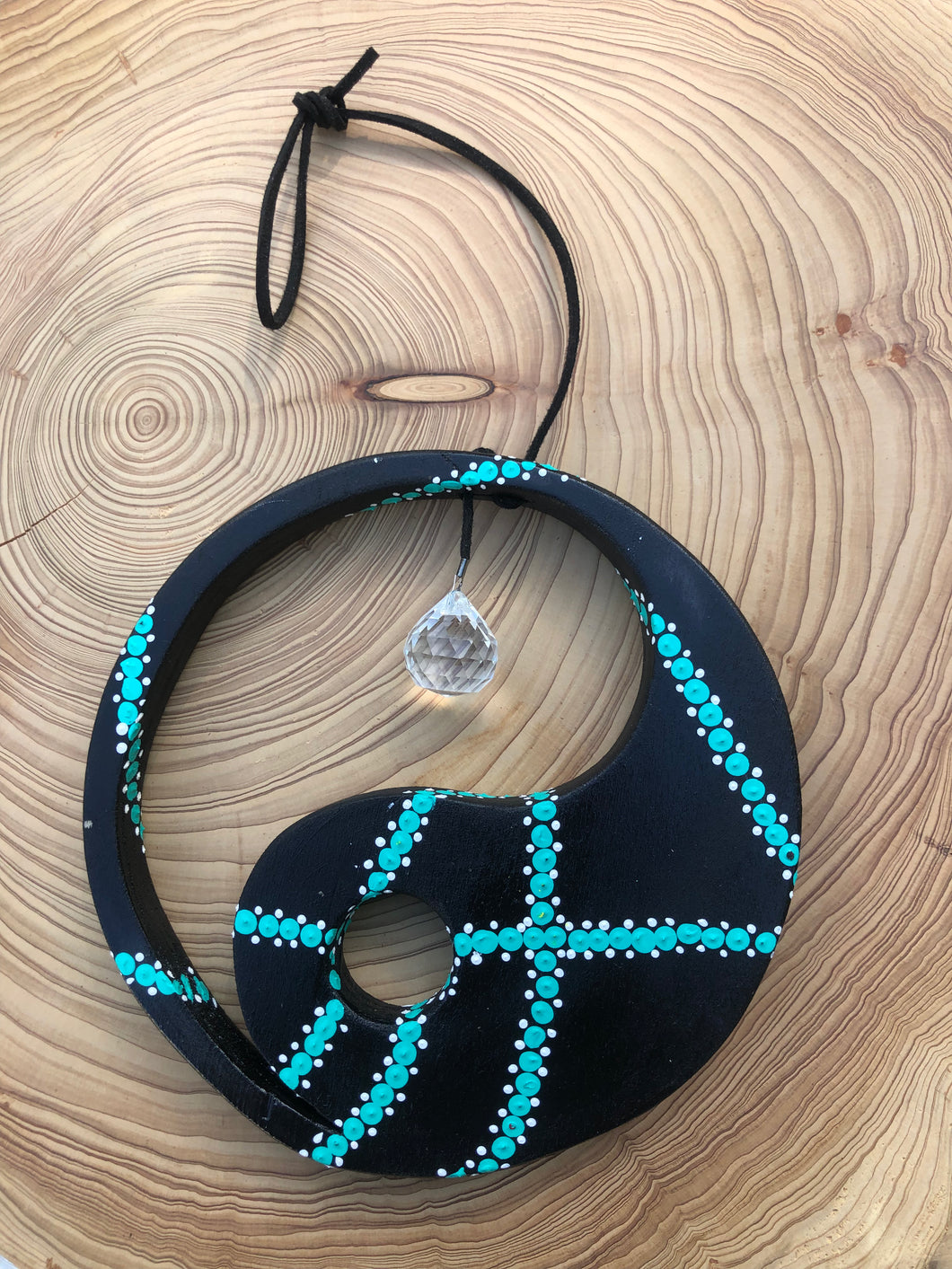 Hand painted Yin yang suncatcher. Made from plywood, decorated with black, turquoise and white acrylic paint with crystal on faux suede cord.