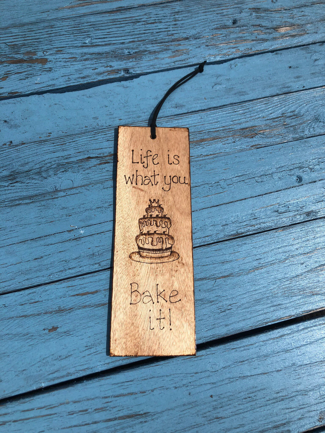 Cake fun hanging sign.